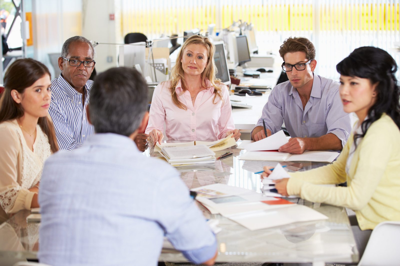 Group of professionals around a table